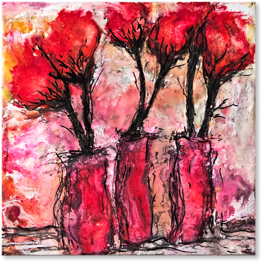 Abstract artwork of trees with a red and pink background
