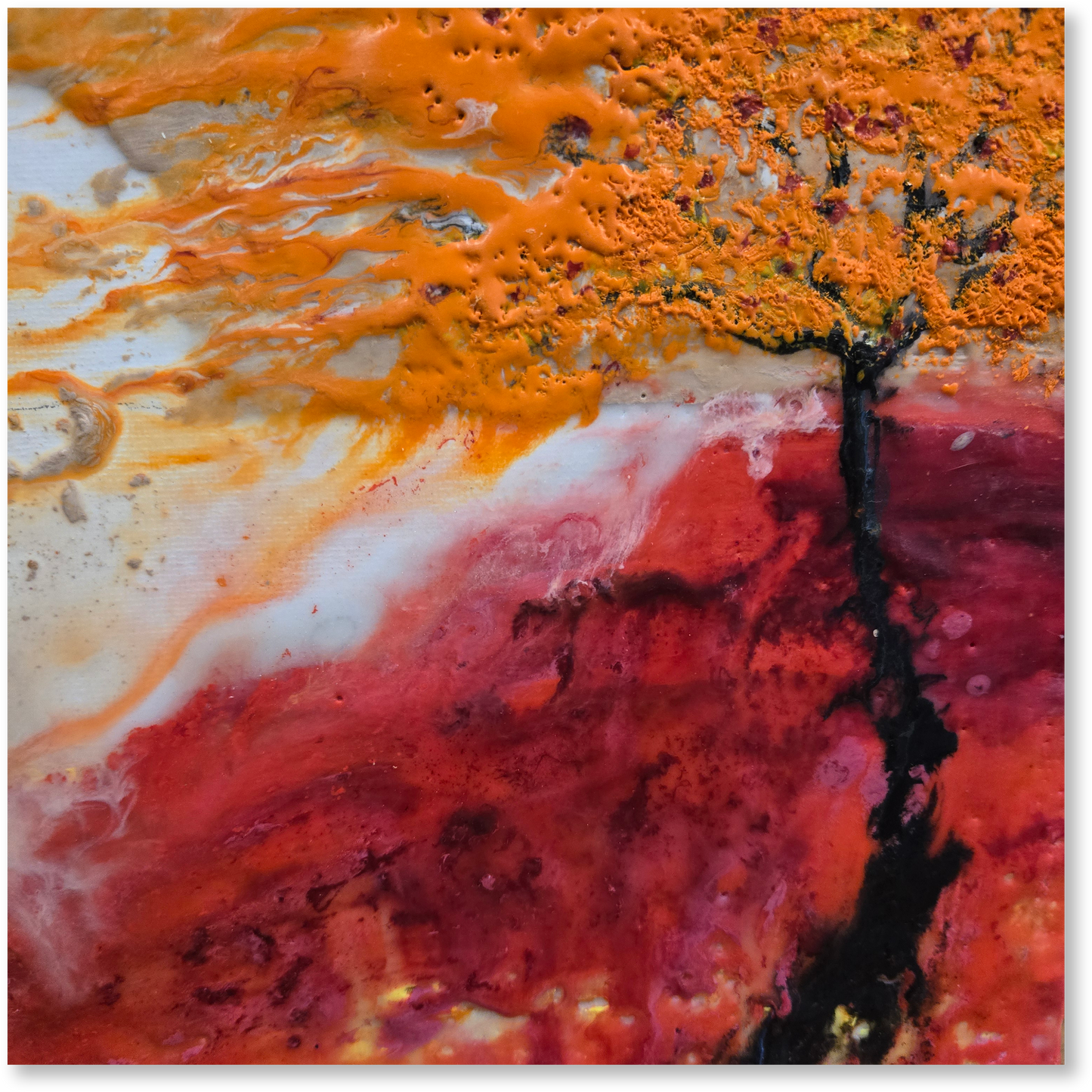 Abstract art with orange, red, and black colors on a textured surface