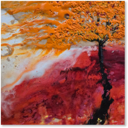 Abstract art with orange, red, and black colors on a textured surface