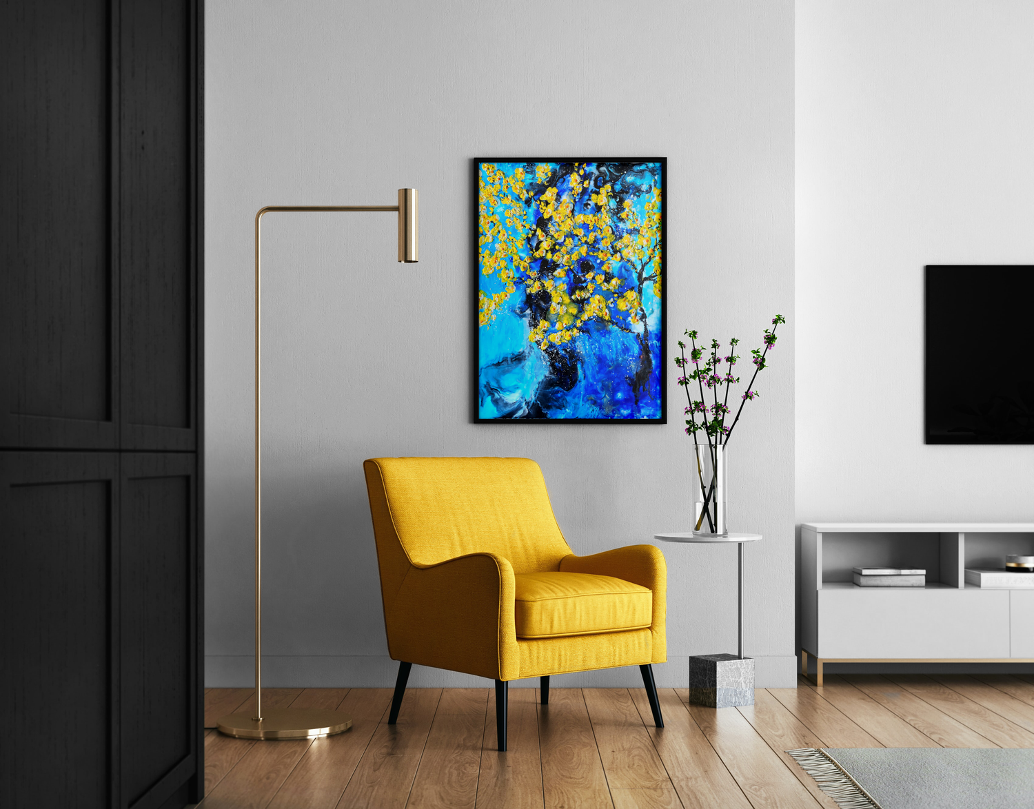 Modern living room with a yellow armchair, gold floor lamp, and abstract painting on the wall.
